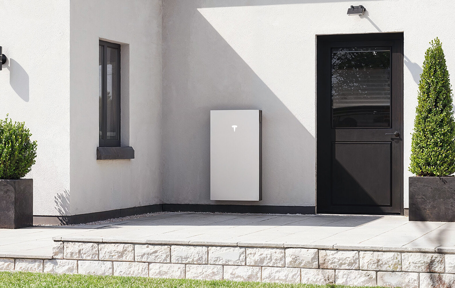 Tesla Powerwall 3 on white wall